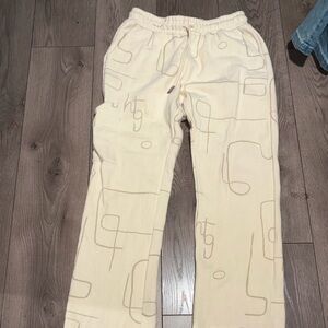 Cream Sweatpants with Abstract Design